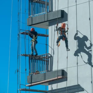 Construction accident: unsafe ladder or scaffold leading to potential fall hazard